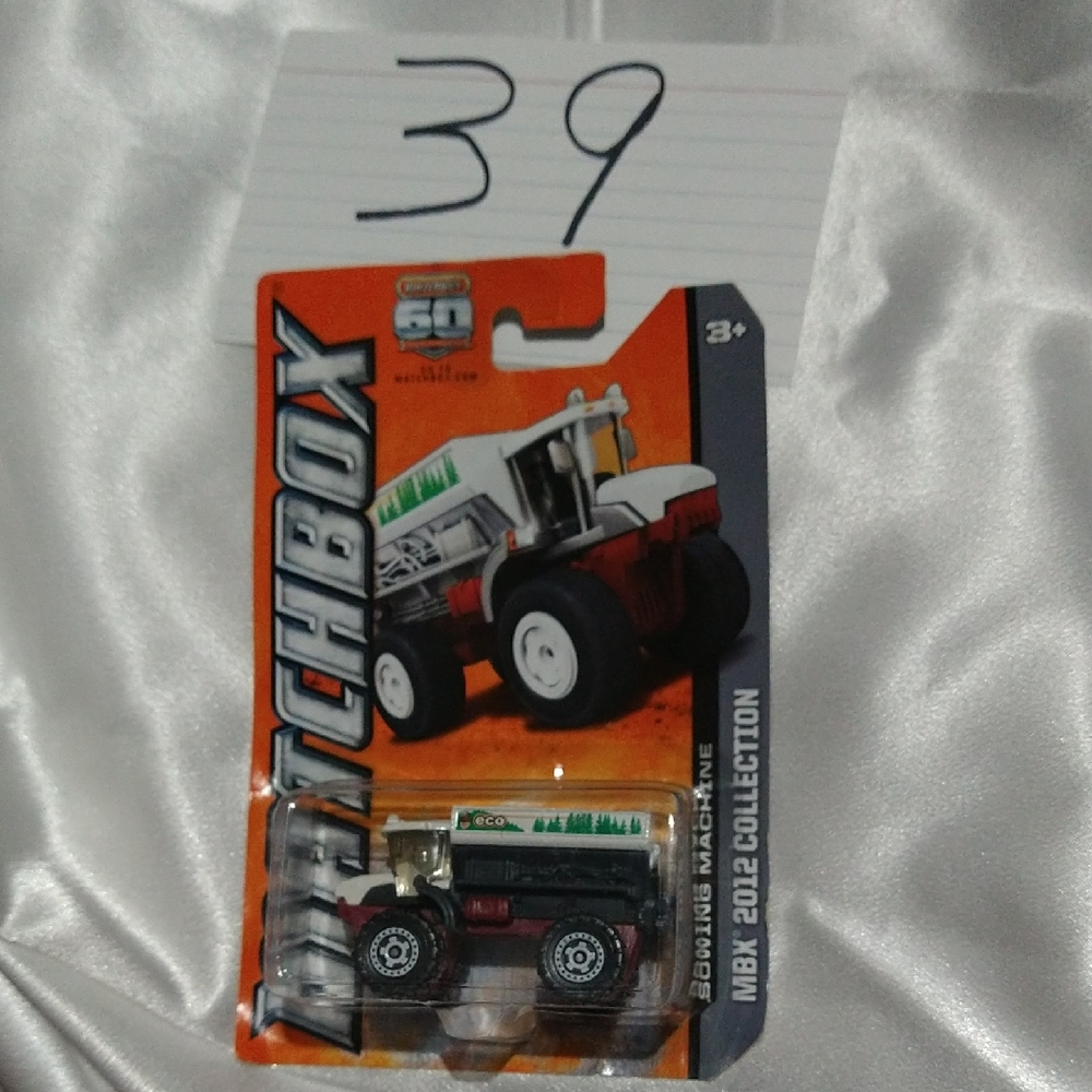 Black and White Die-Cast Model Tractor Toy